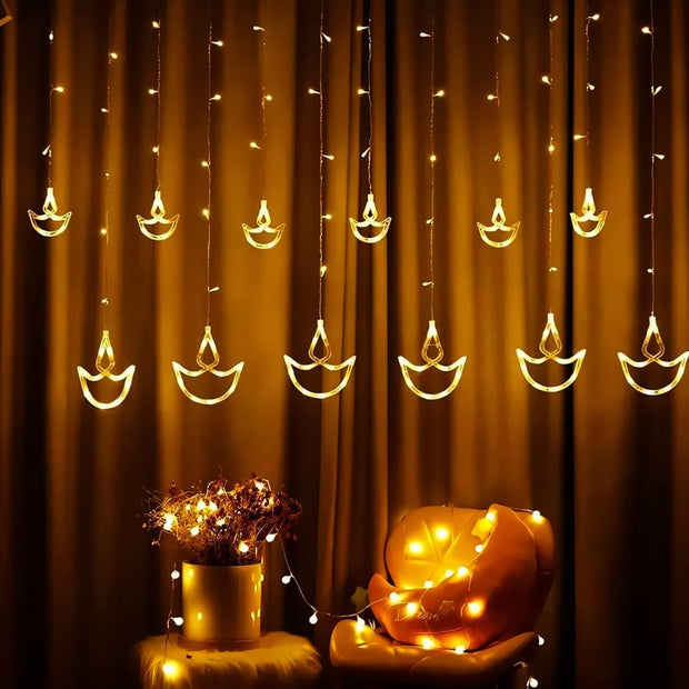 Cool White Diya Curtain String Light with 138 LEDs, 6 Big + 6 Small Diyas with 8 Modes, Extendable amiciKart c0tmiz-hs.myshopify.com